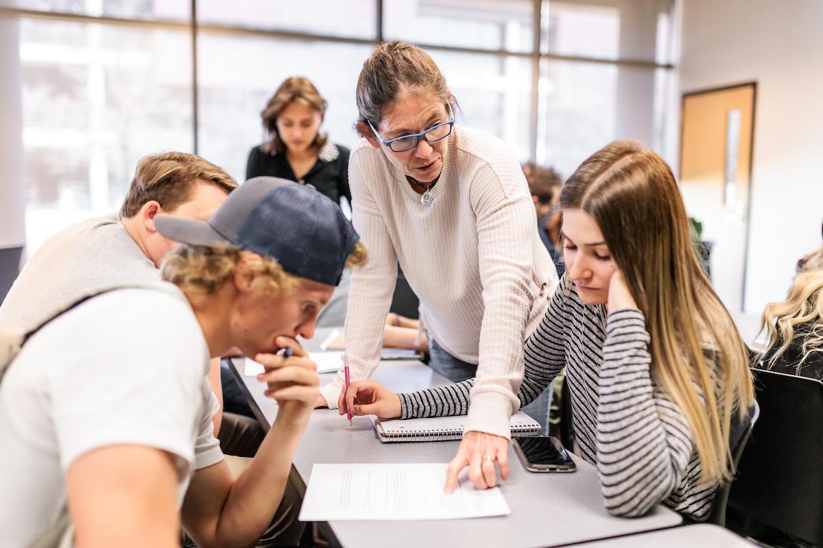 Metropolitan State University of Denver students collaborating at a desk.