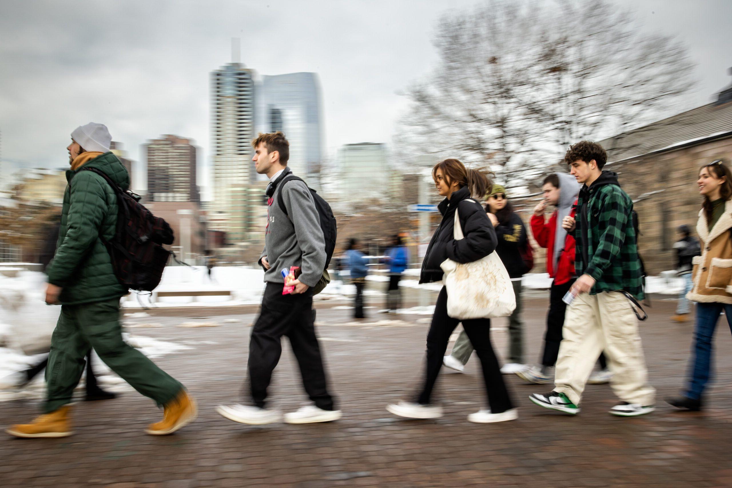 Student walking on Auraria campus