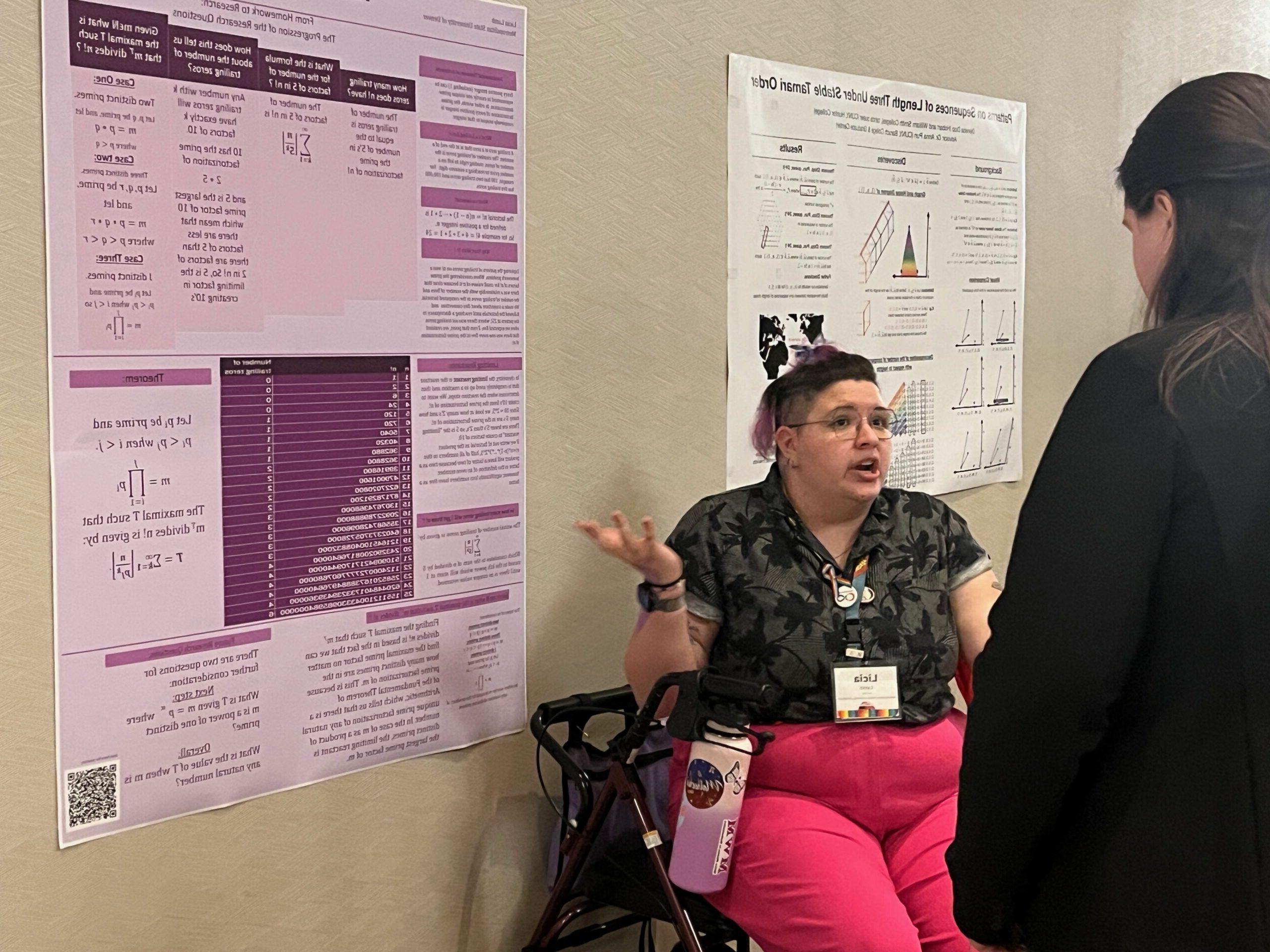 Licia, an MSU Denver math student, presents on their research in a poster session at the 2025 Nebraska Conference for Undergraduate Women in Mathematics.